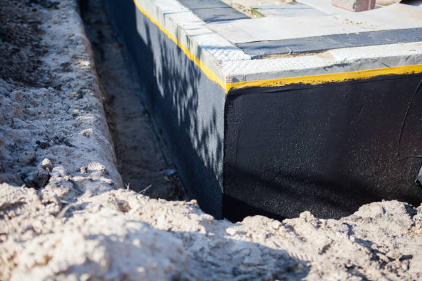 Professional Foundation Crack Repair technician working in Montgomery, MI